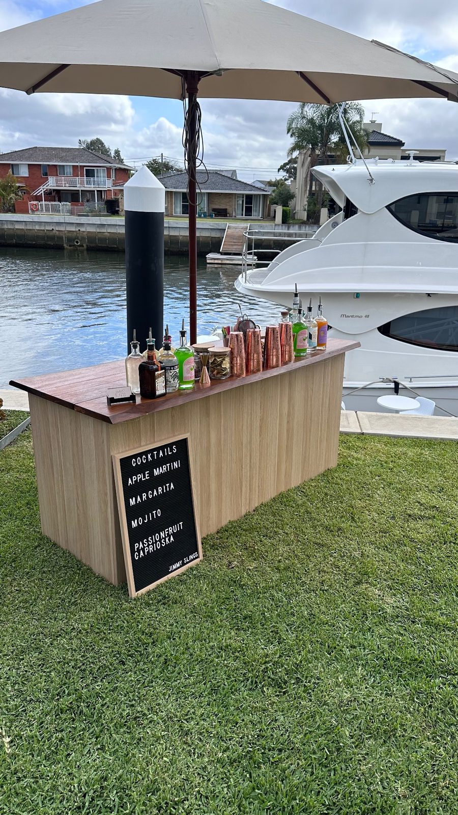 A custom timber bar built into a private home