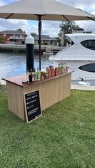 A custom timber bar built into a private home